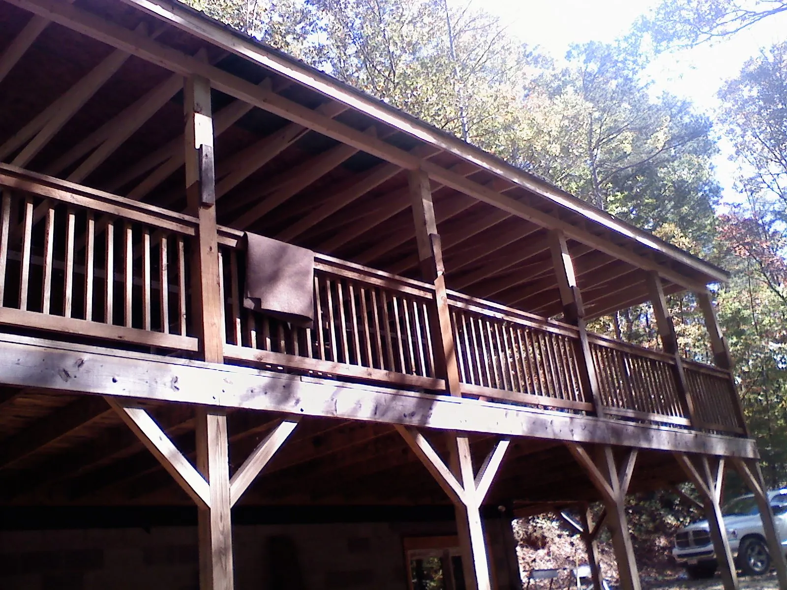 Timber framing under a new elevated porch and deck — Roof Leak Repair in Front Royal by Roofing Brothers